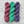 Charger l&#39;image dans la galerie, 1 trio d&#39;écheveaux de laine québécoise teinte à la main aux couleurs inspirées des années 90. De gauche à droite: rose, vert aqua, violet.
